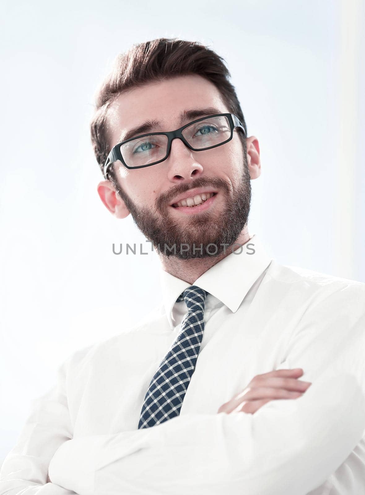 close up.portrait of a successful young businessman. by asdf