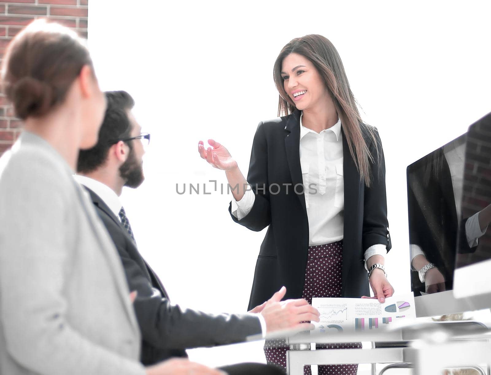 business woman holds a working meeting in the office . business concept