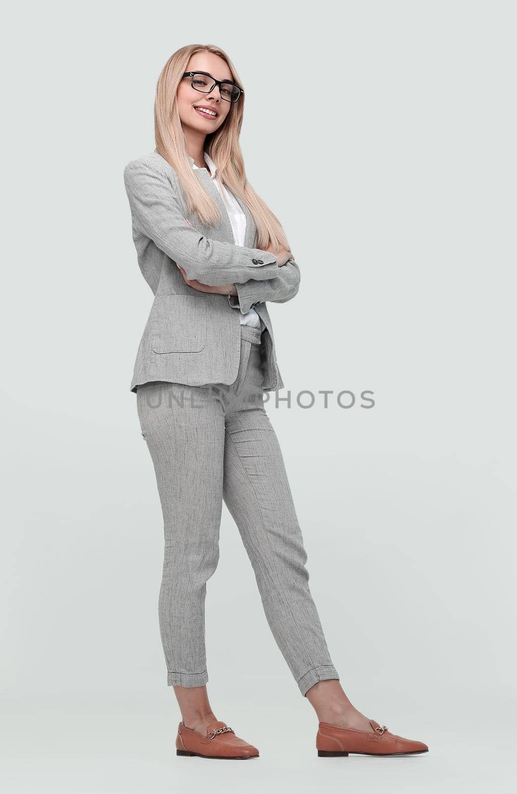 in full growth. portrait of a successful confident businesswoman .isolated on white background
