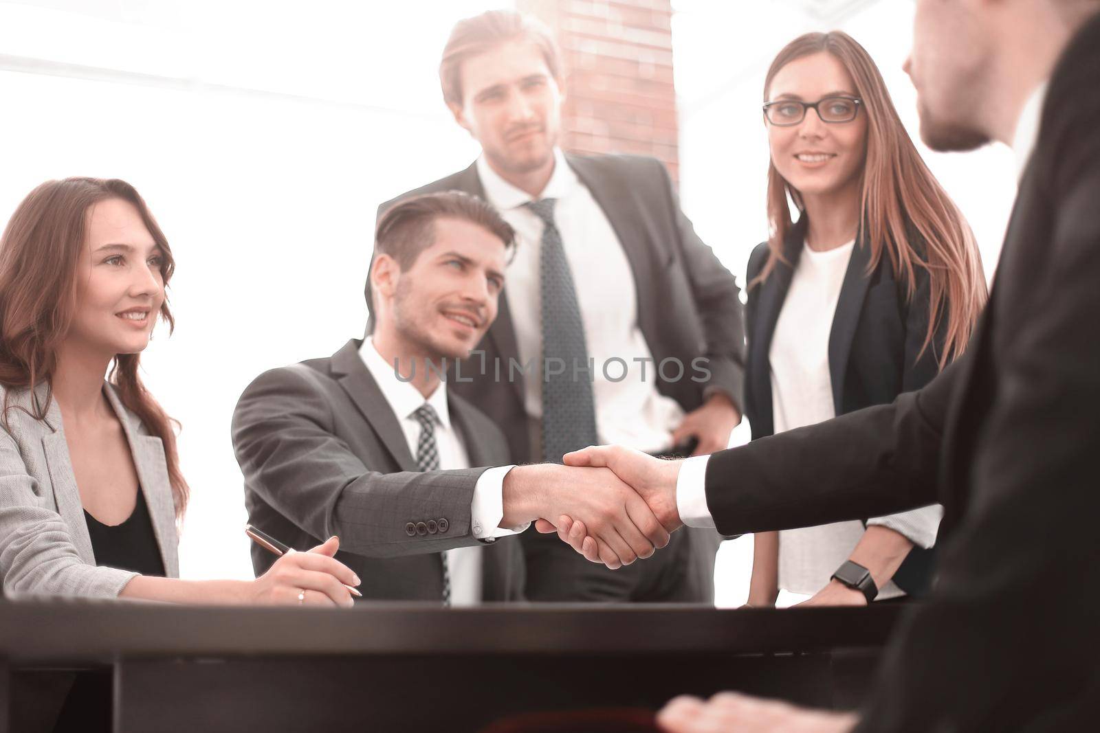 Business colleagues sitting at a table during a meeting