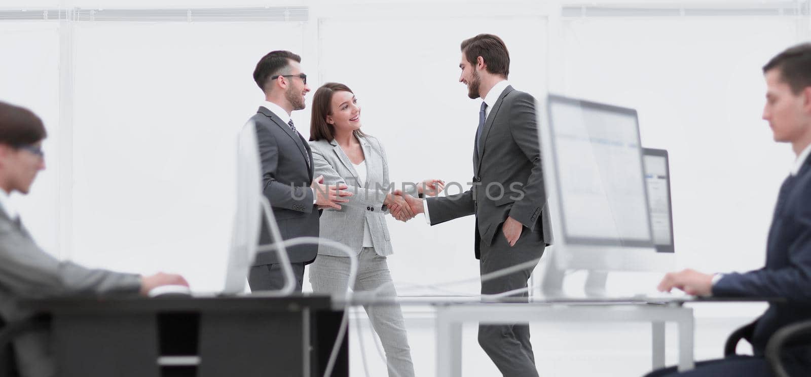 Salesmen and buyer discuss the contract by asdf