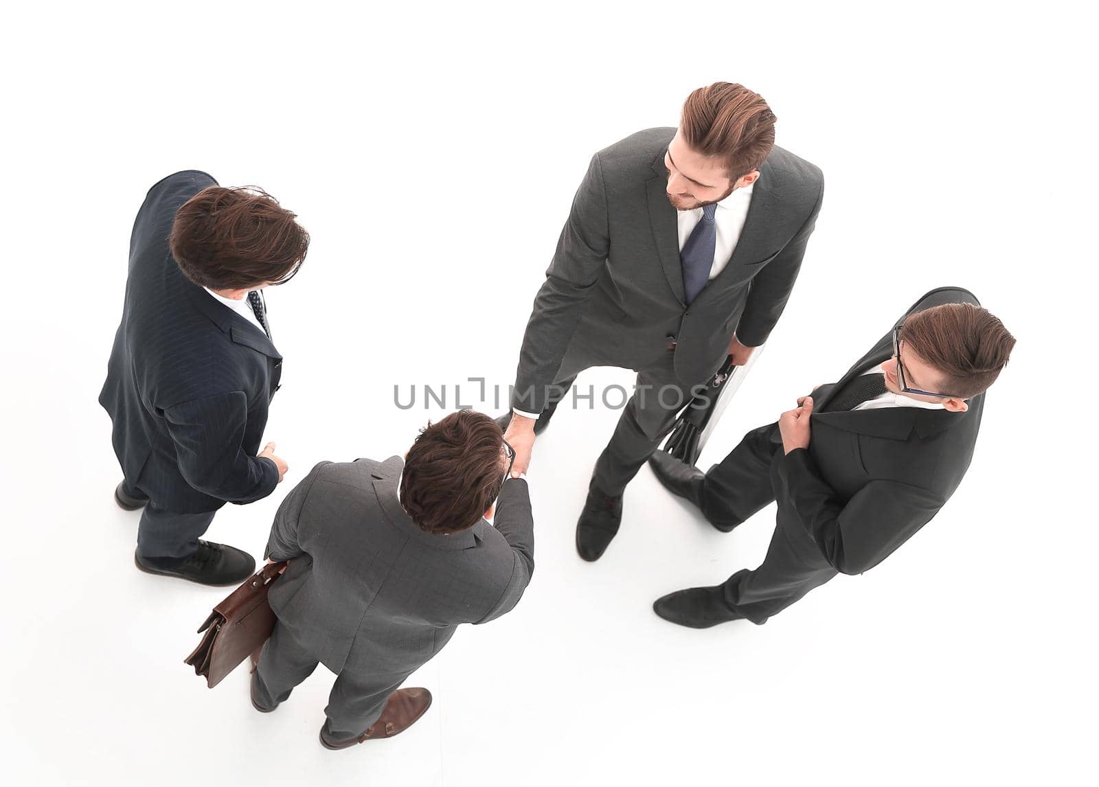 top view. business partners affirming the contract.isolated on white.