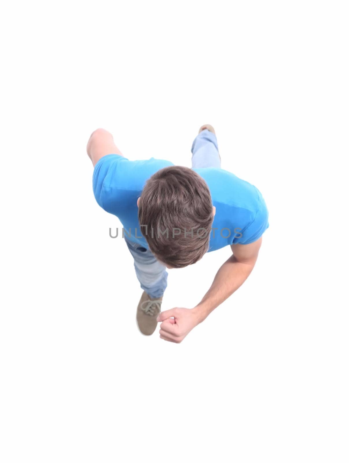 top view. young man stepping forward. isolated on white background