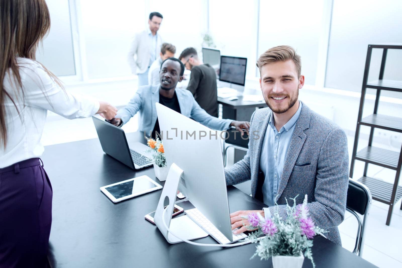 employee sitting at his Desk in the office.business people