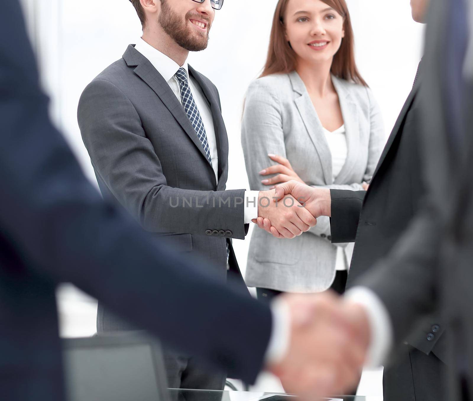 partnership business handshake in officce