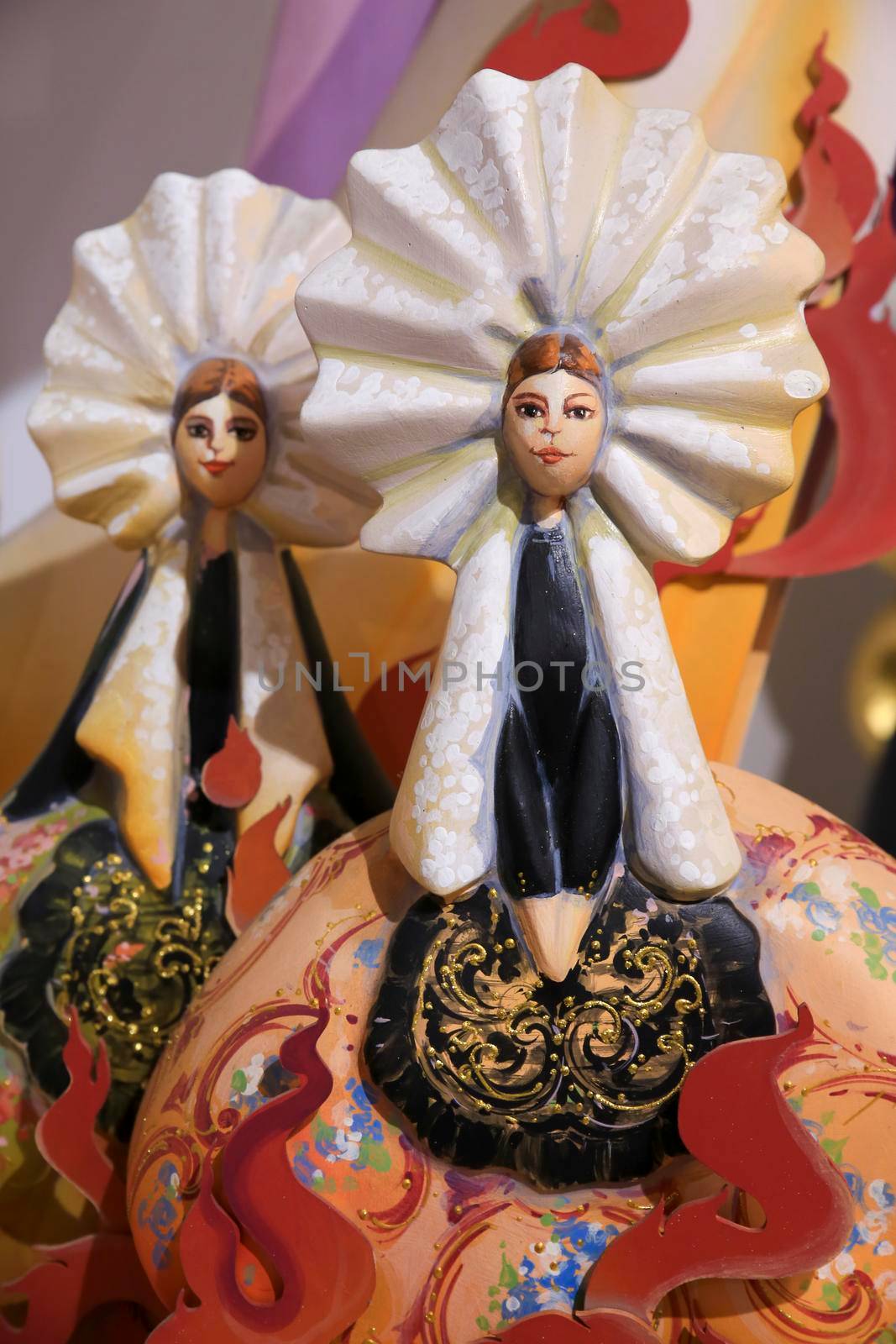 Alicante, Spain- May 12, 2022: Vintage cardboard figurines of fallera women in traditional costumes exhibited in The Hogueras Museum of Alicante