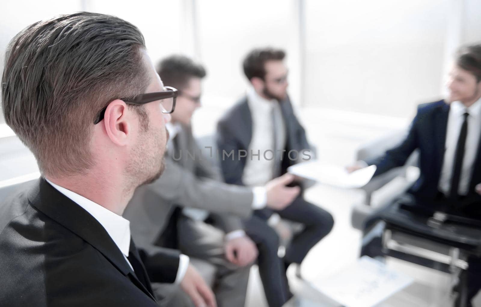 businessman at a business meeting in the office. by asdf