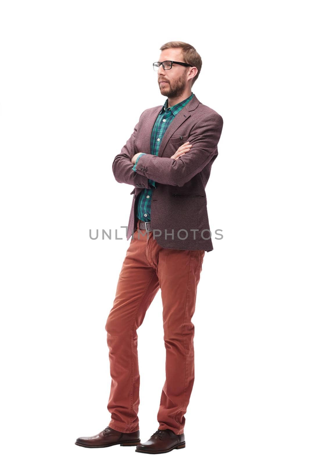 in full growth. confident man looking at copy space . isolated on white background