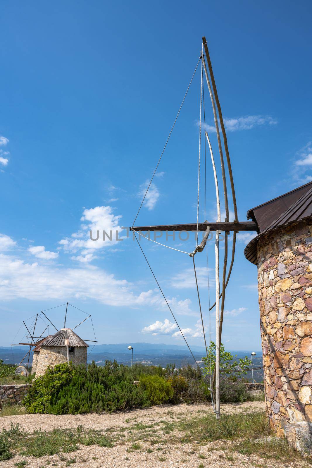 Stone windmills in Penacova by homydesign