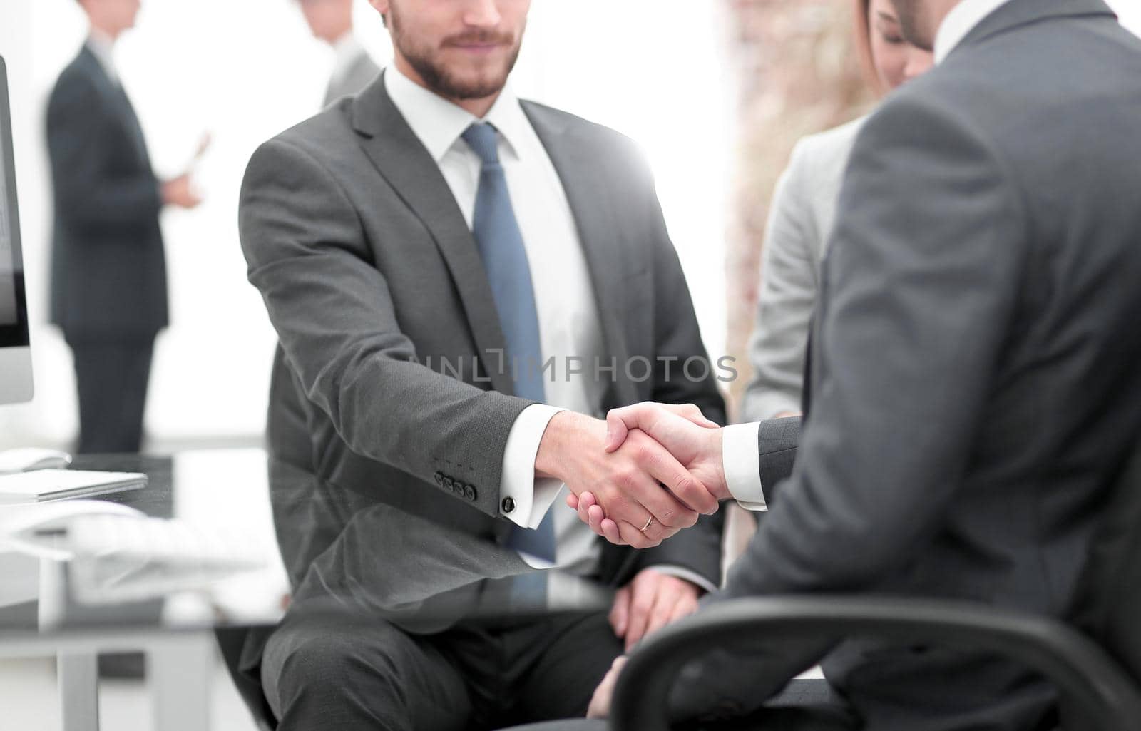 Picture showing manager introducing new worker to the team