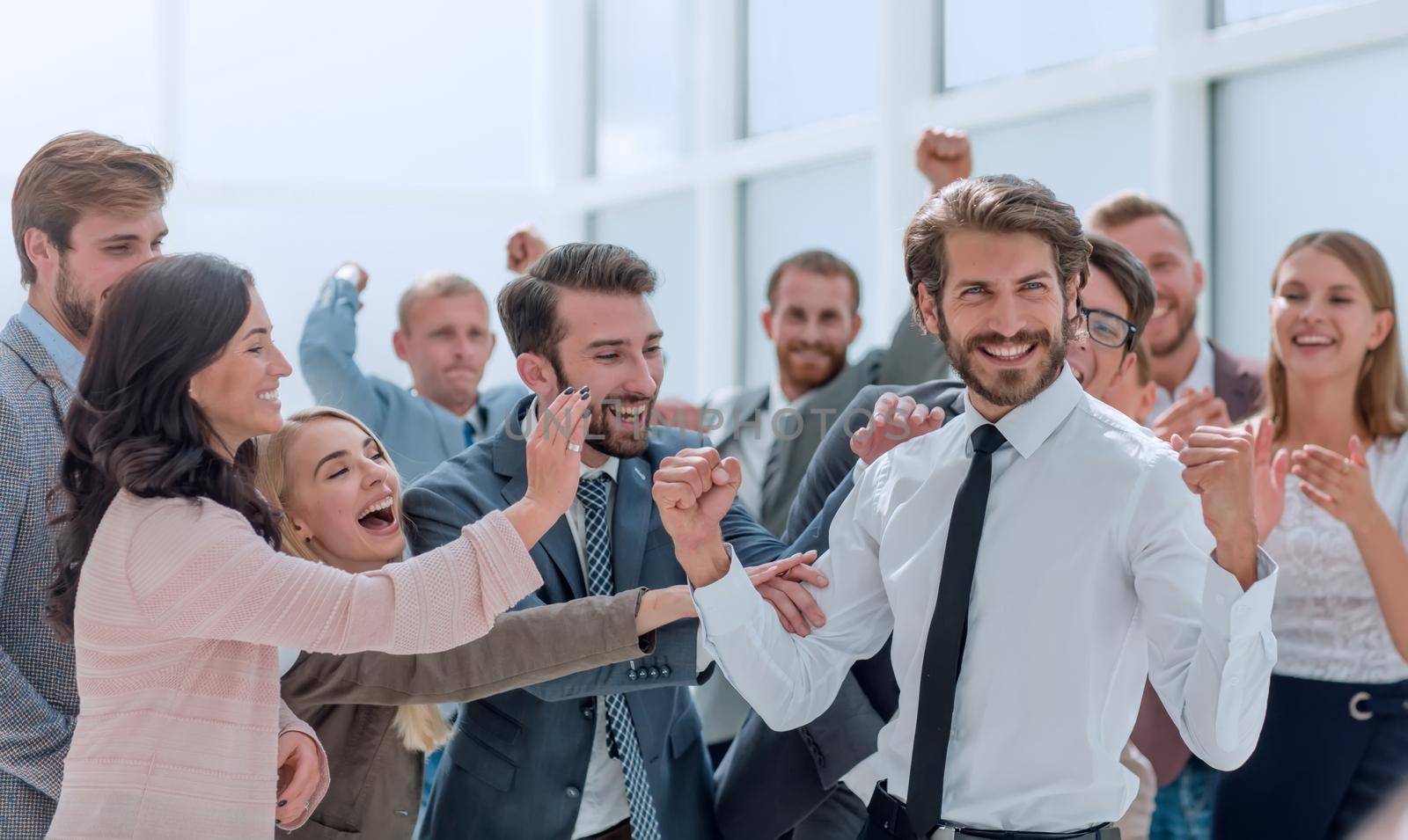 young entrepreneur and happy business team standing together. photo with copy space