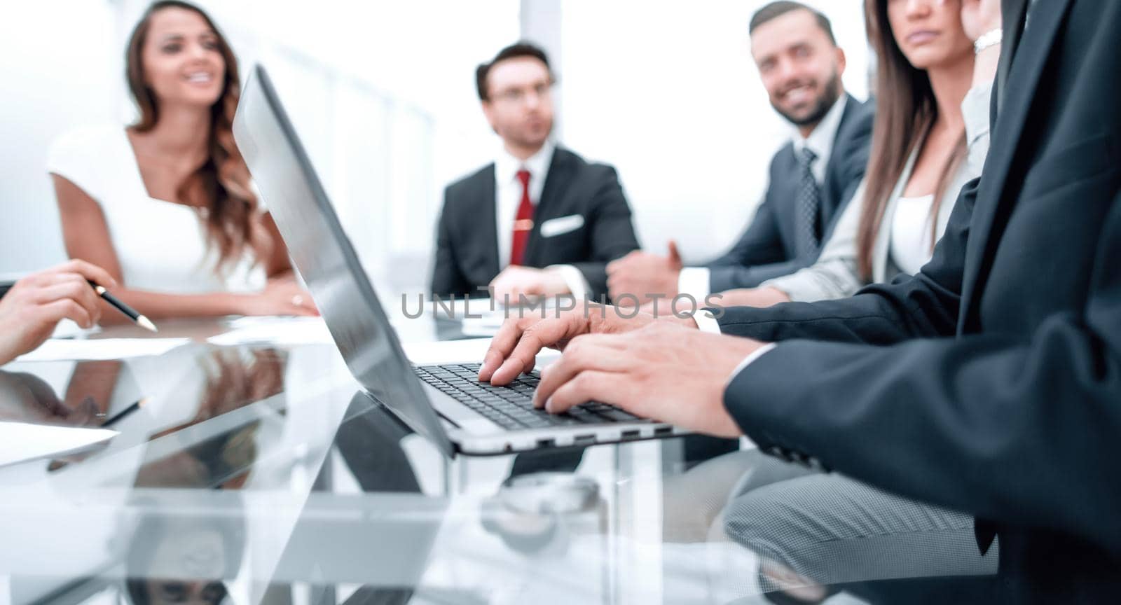 Businessman using laptop during a meeting of the Board of Directors by asdf
