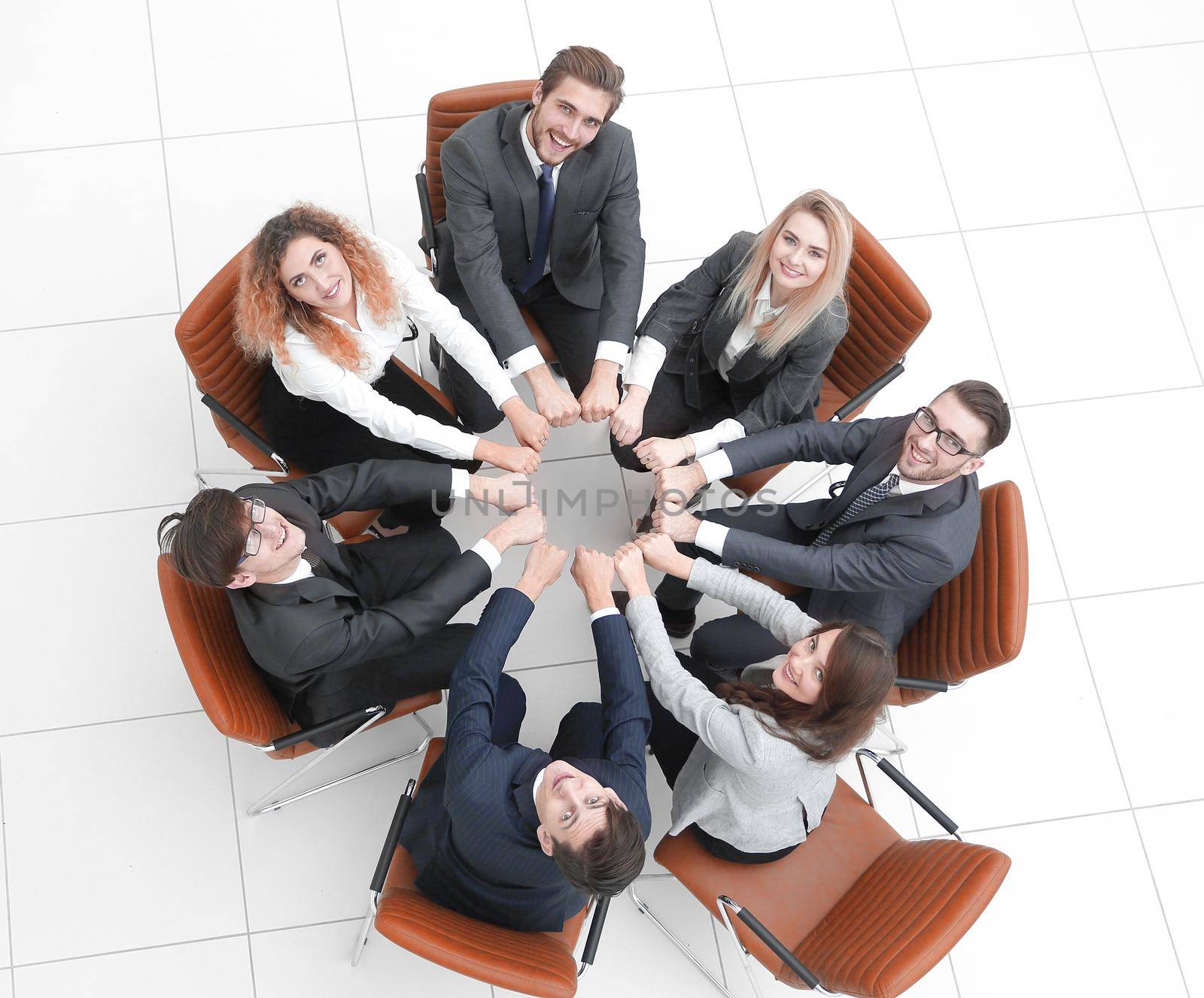 friendly business team sitting in a circl by asdf