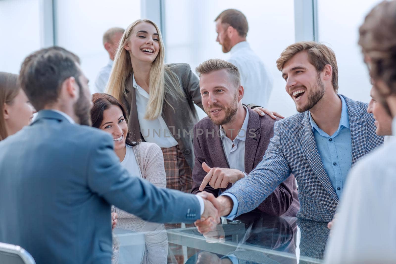 handshake business partners during a meeting in the office. concept of cooperation