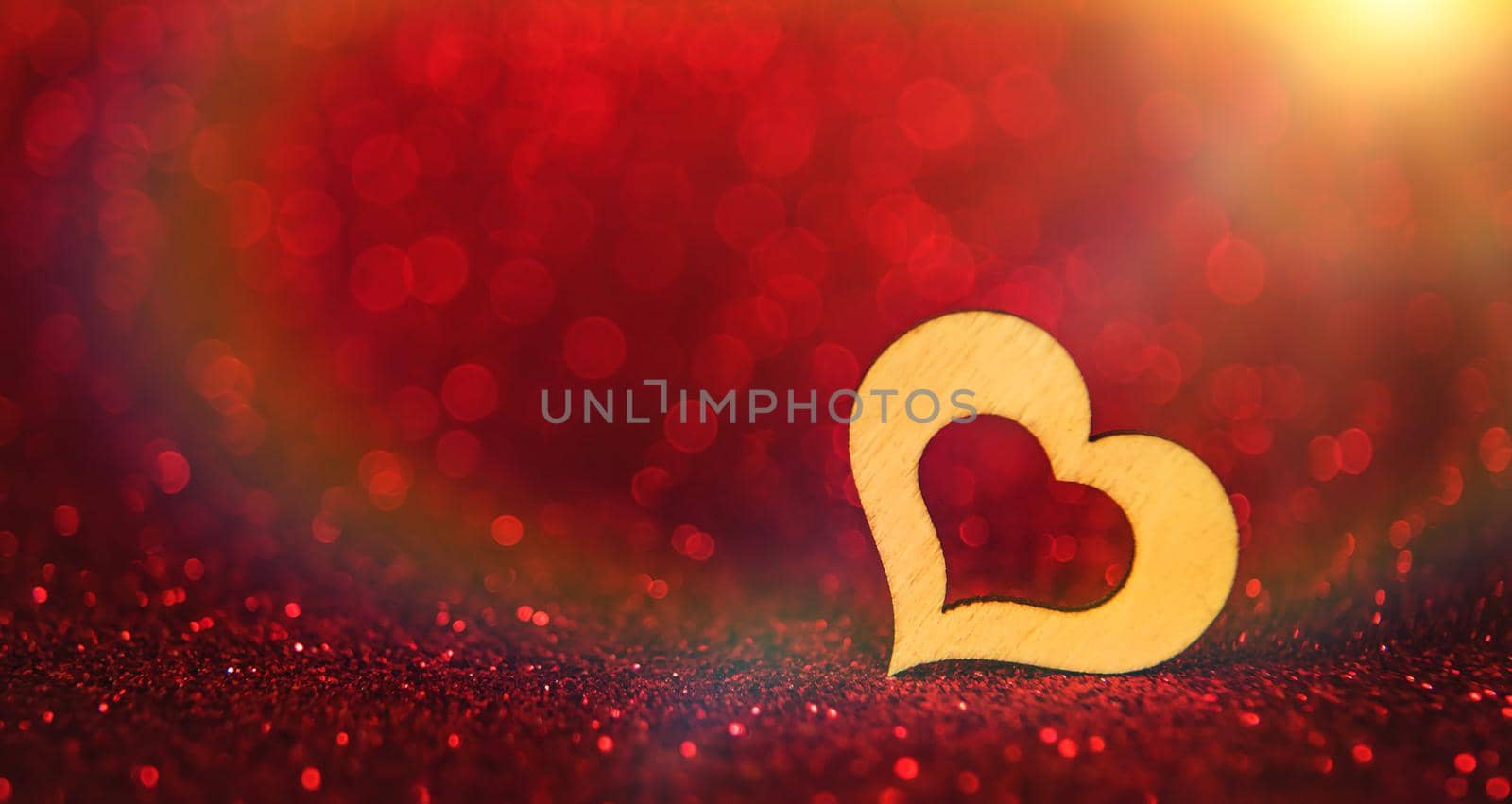 Shiny background with valentine heart. Selective focus. by yanadjana