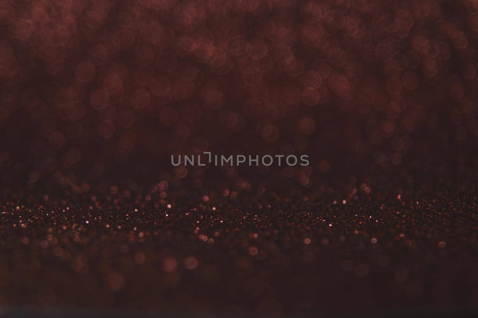 Shiny background with bokeh lights. Selective focus. by yanadjana