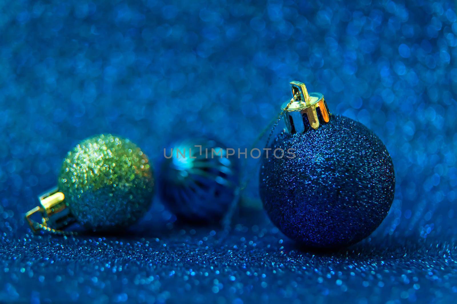 Christmas tree decorations on a shiny background. Vibratory focus. Holiday.