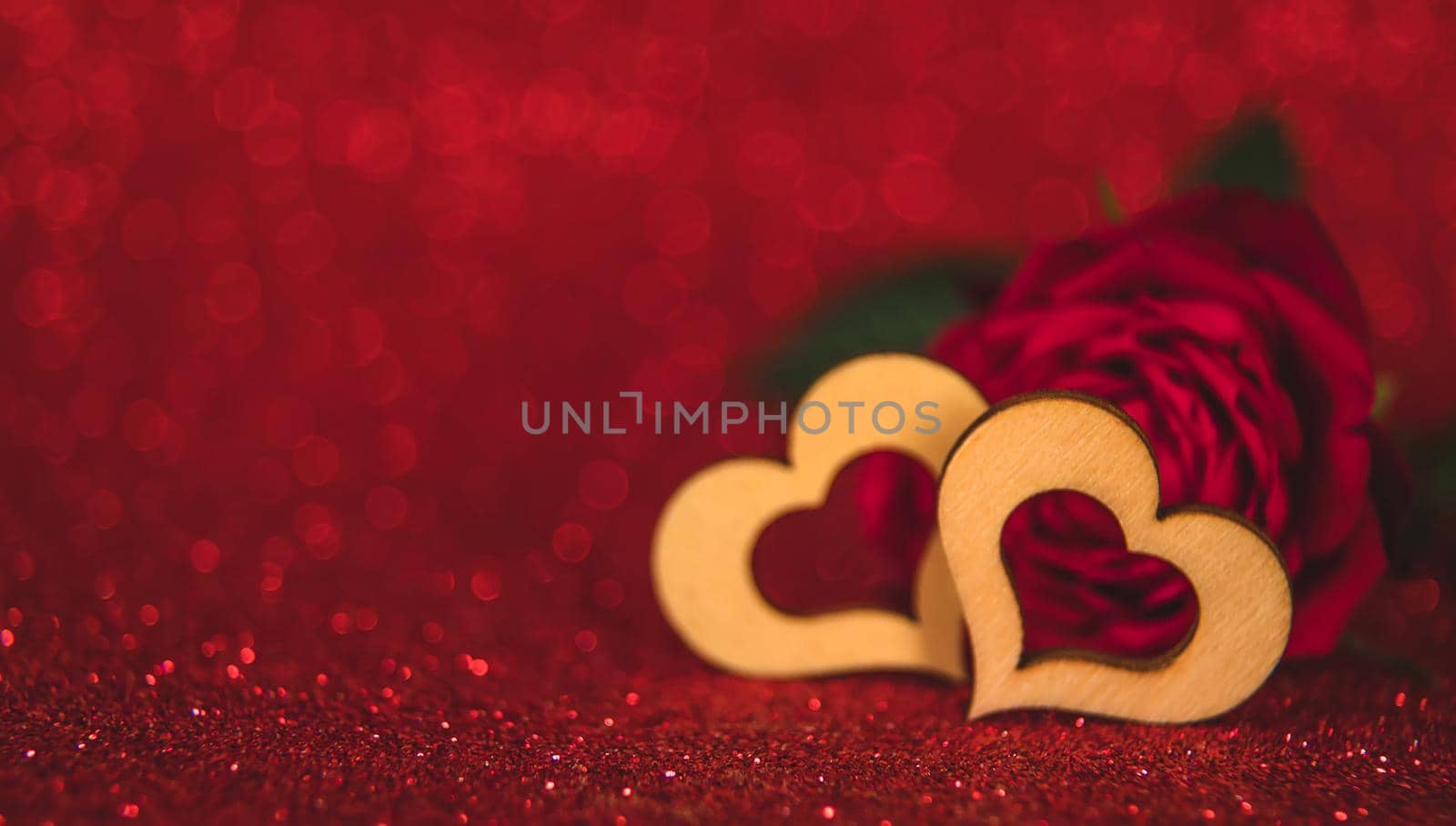 Shiny background with valentine heart. Selective focus. by yanadjana