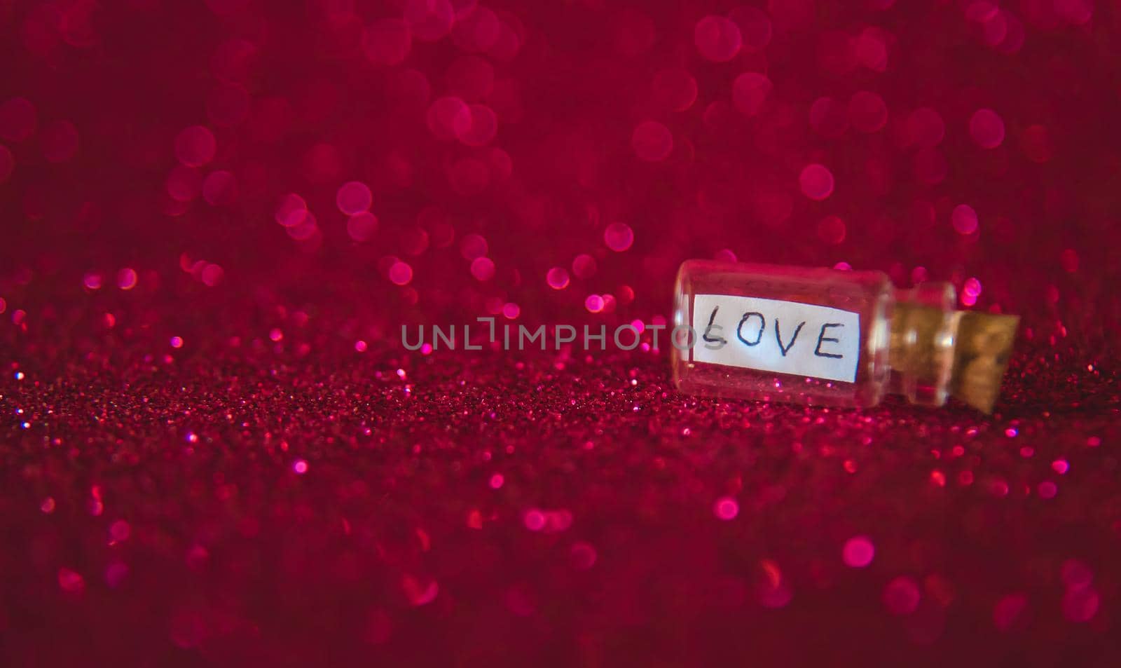 Shiny background with valentine heart. Selective focus. by yanadjana