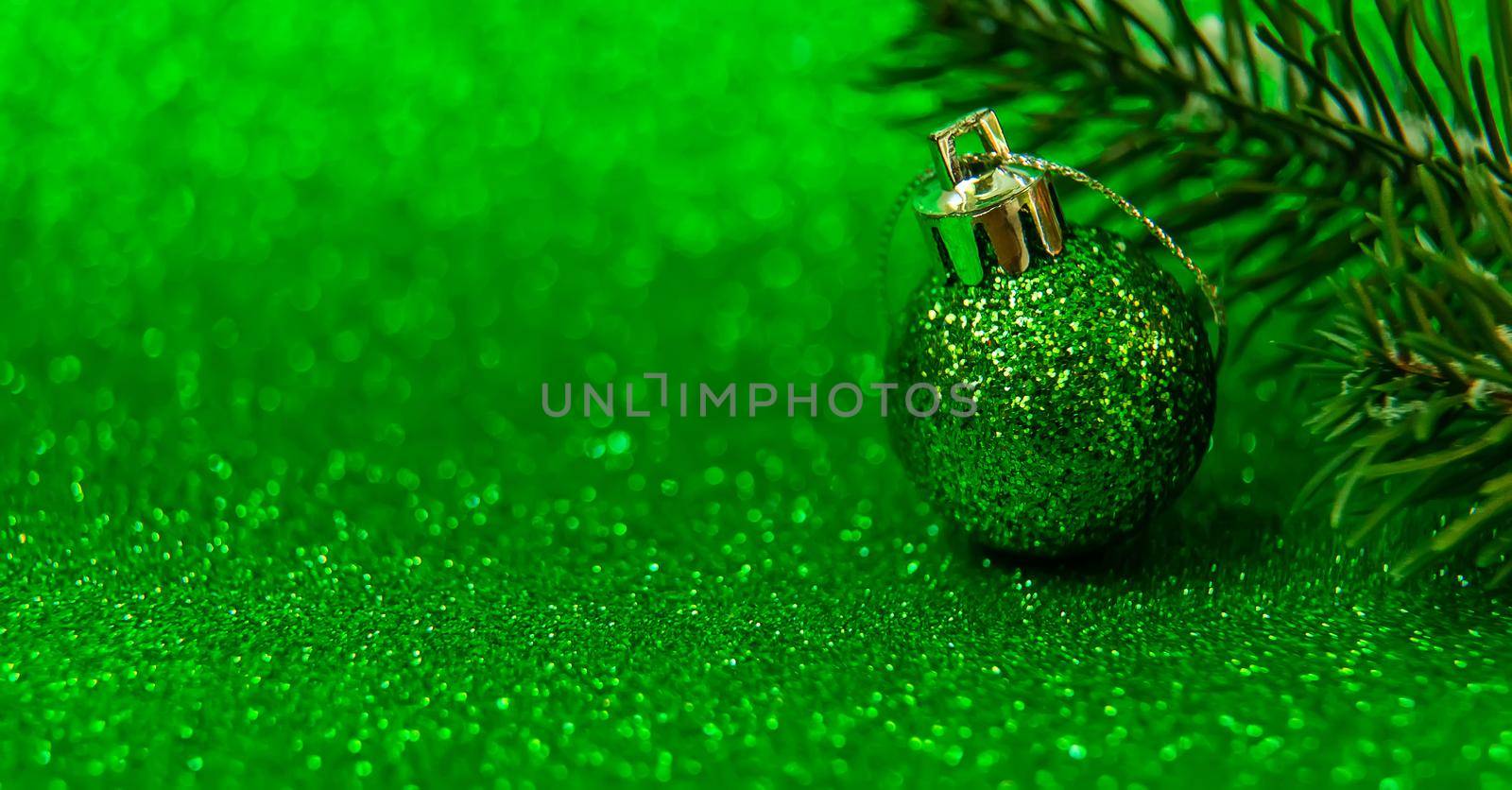 Christmas tree decorations on a shiny background. Vibratory focus. by yanadjana