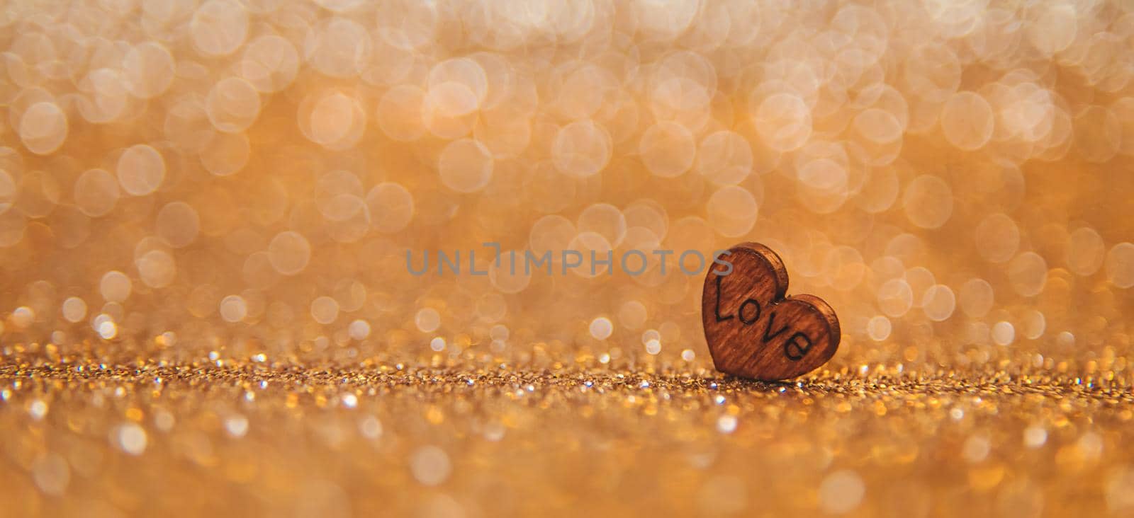 Shiny background with valentine heart. Selective focus. by yanadjana