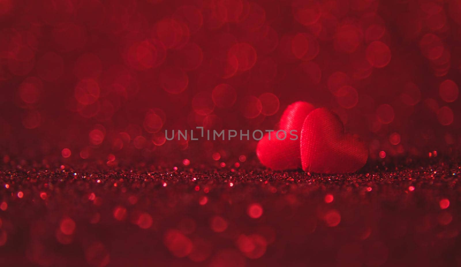 Shiny background with valentine heart. Selective focus. by yanadjana