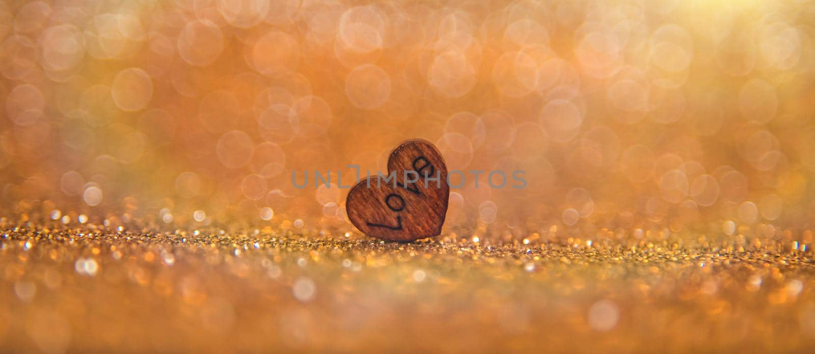 Shiny background with valentine heart. Selective focus. Love.