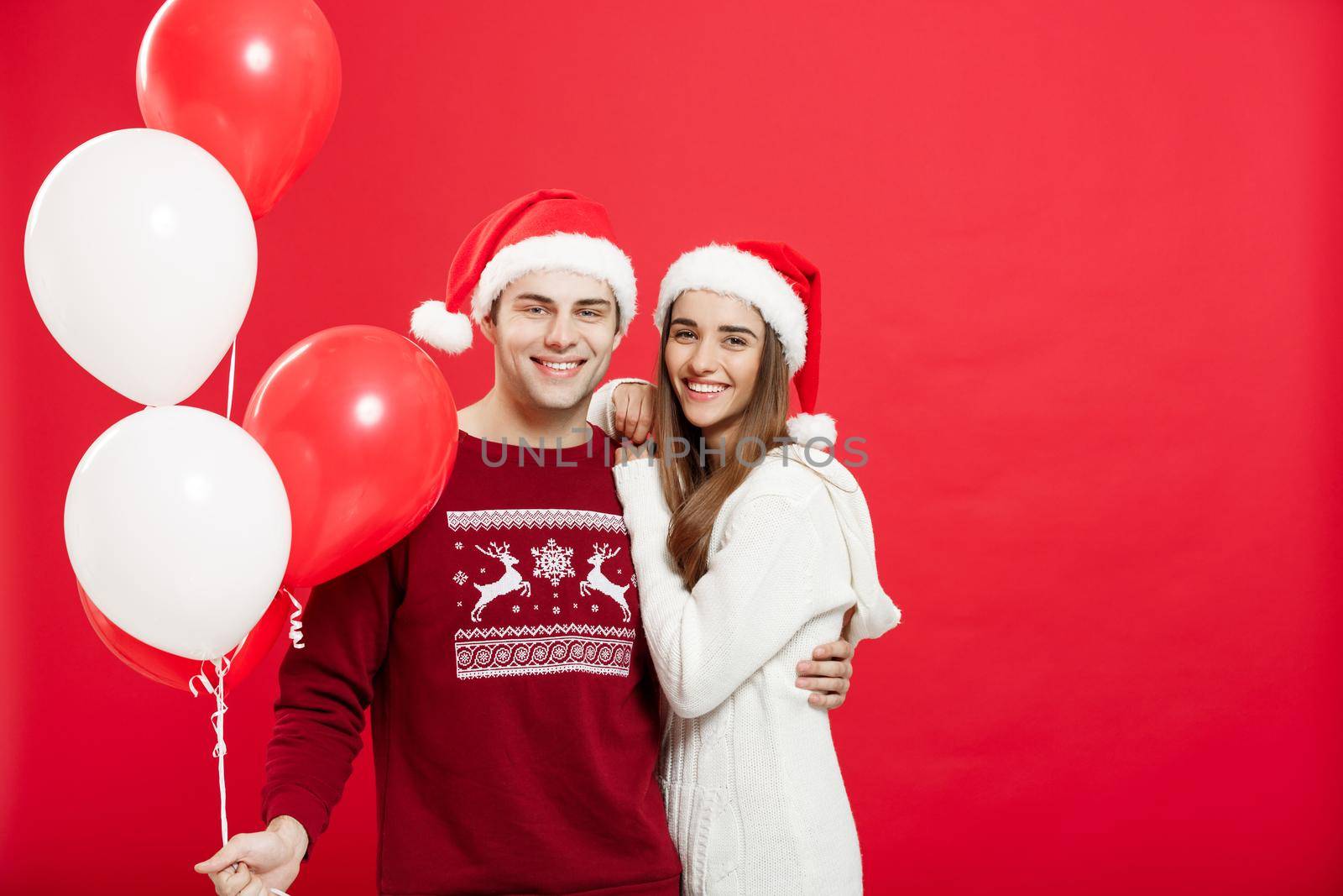 Christmas concept - Portrait of a romantic young couple with chr by Benzoix