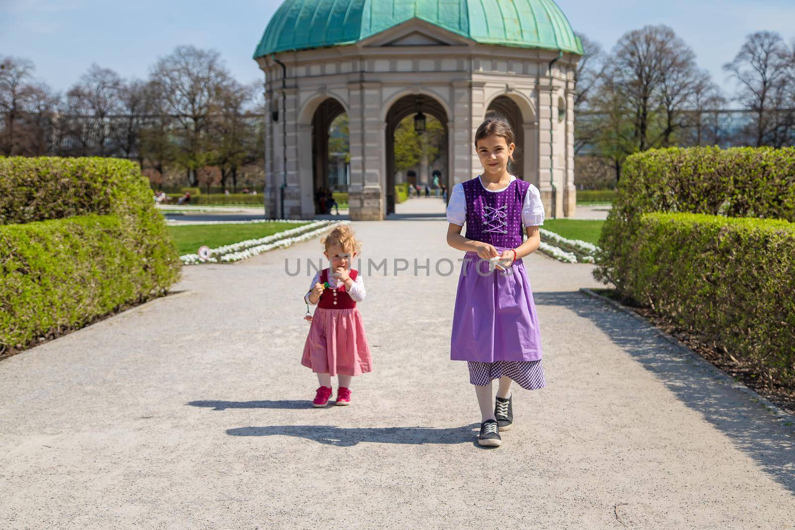 Children in Munich, Germany in national costumes. Selective focus. by yanadjana