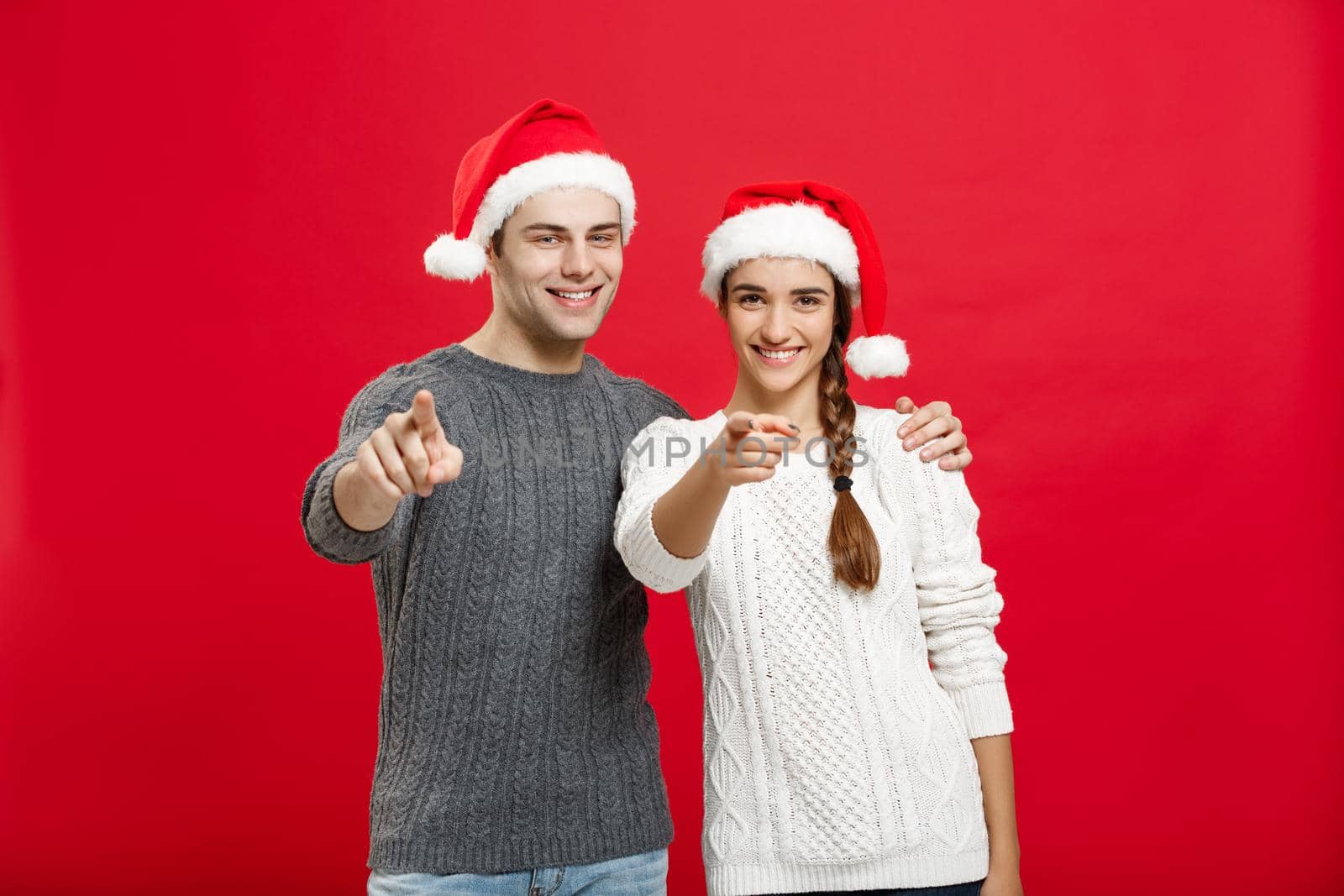 Christmas Concept - portrait lovely young couple finger on side well use for presentation or montage by Benzoix