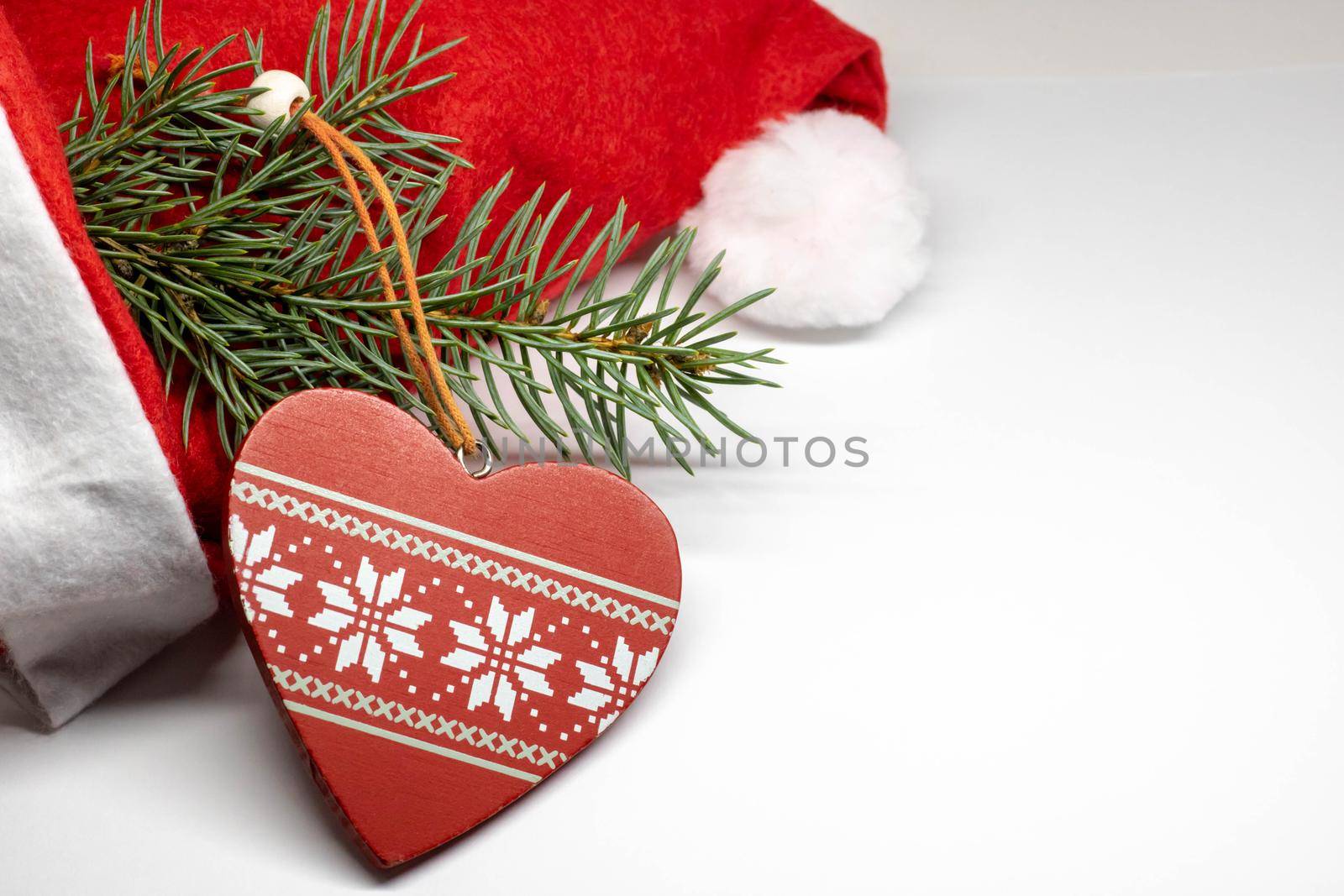 Santa Claus red cap on white background. heart