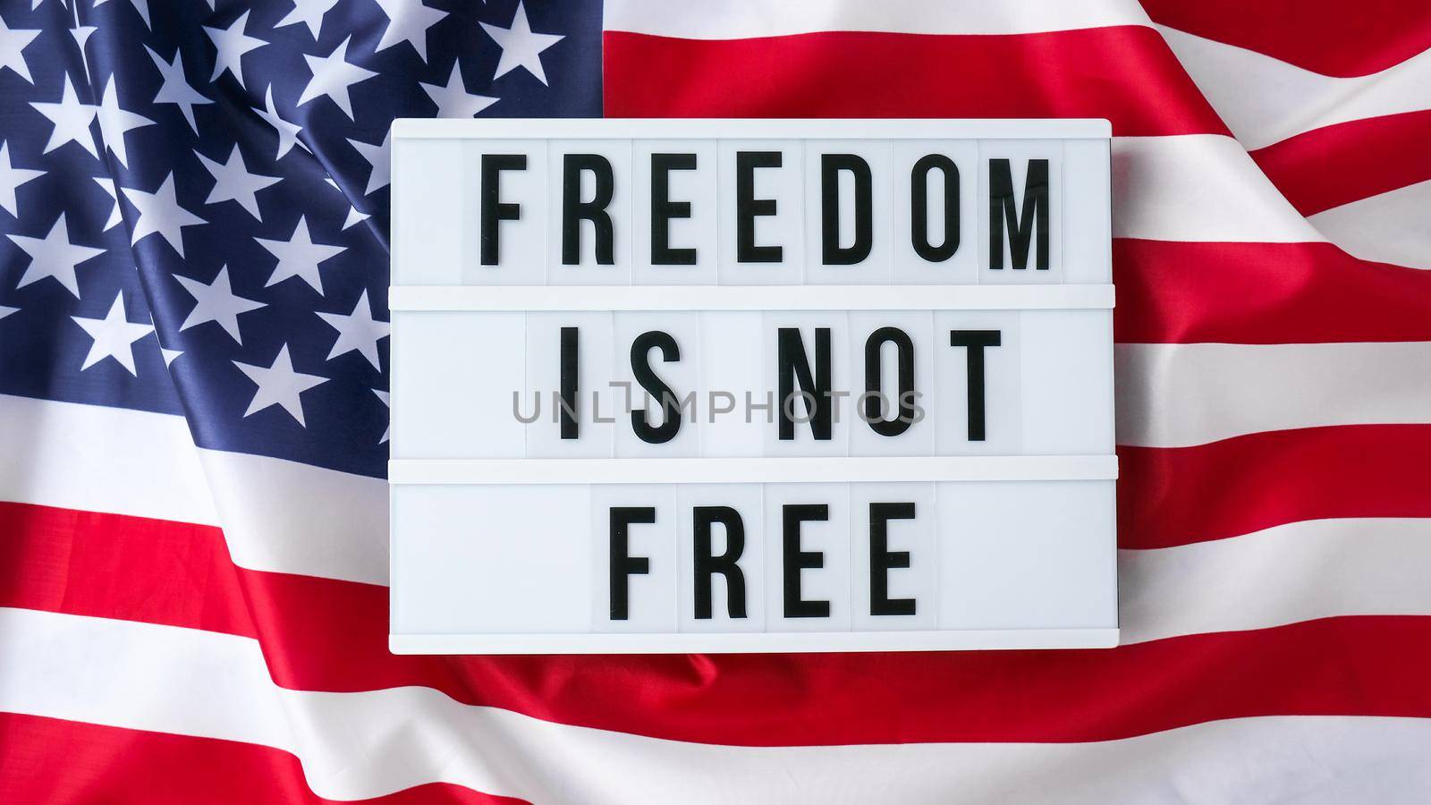 American flag. Lightbox with text FREEDOM IS NOT FREE Flag of the united states of America. July 4th Independence Day. USA patriotism national holiday. Usa proud. Freedom concept