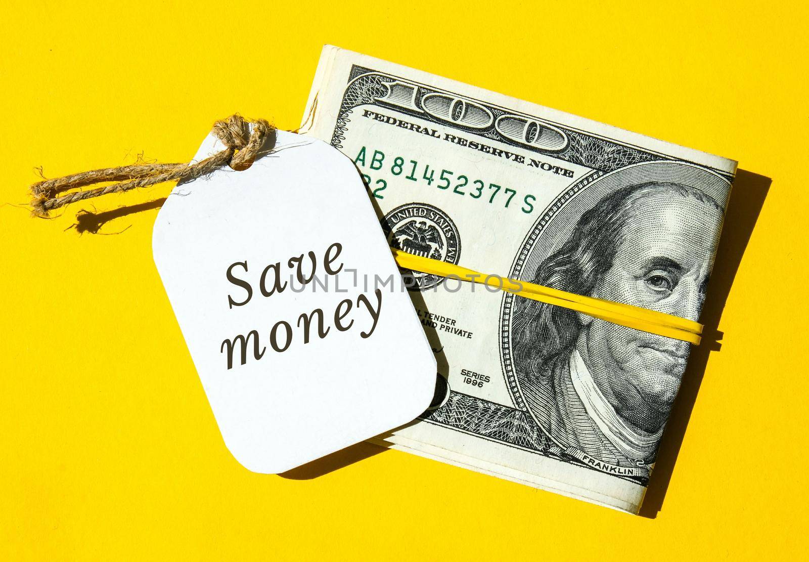 Paper note written text SAVINGS. Save money. Save today for tomorrow Dollar banknotes. Money, Business, finance, investment, saving. Cash bill. Business budget of wealth and prosperity finance