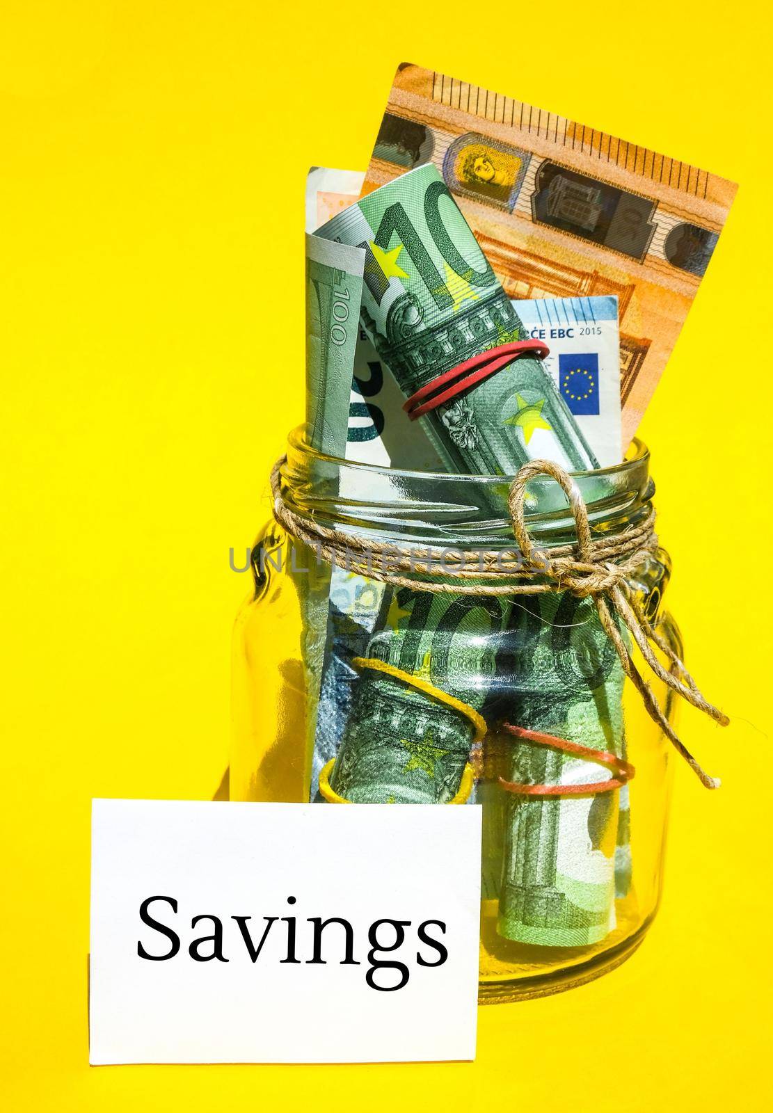 Paper note written text SAVINGS. Save money. Save today for tomorrow Euro banknotes. Money, Business, finance, investment, saving. Cash bill. Business budget of wealth and prosperity finance