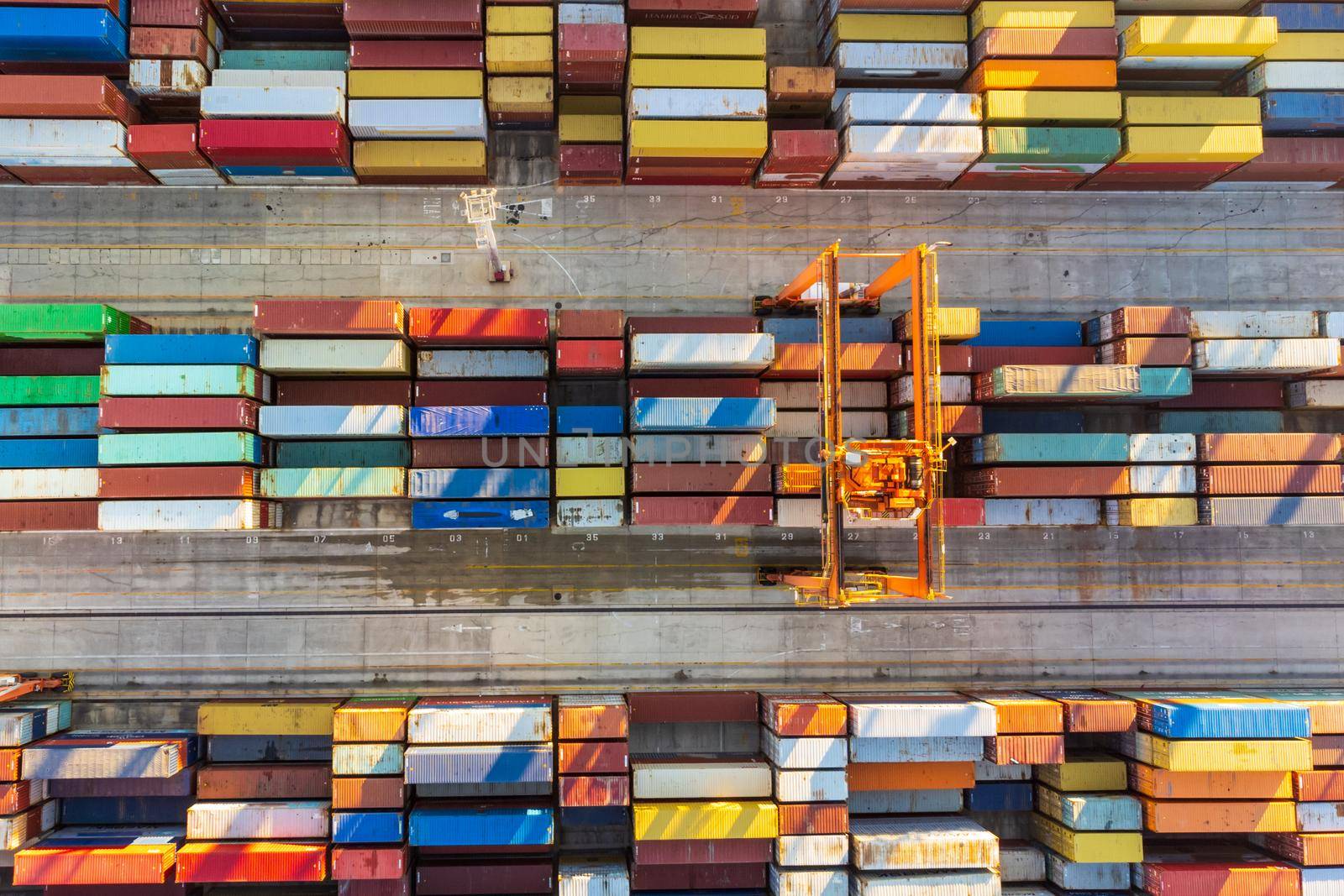 Aerial view of shipping container port terminal. Colourful pattern of containers in harbor. Maritime logistics global inport export trade transportation. by kasto