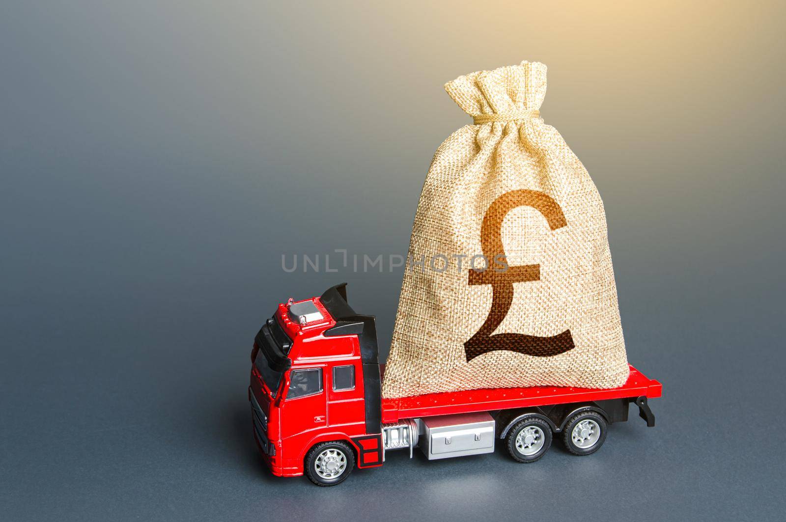 Truck with a british pound sterling money bag. Financial aid, investments and subsidies. Compensation. High super income. Payment of taxes. Cash collection. Money transfers and transactions. Loan by iLixe48