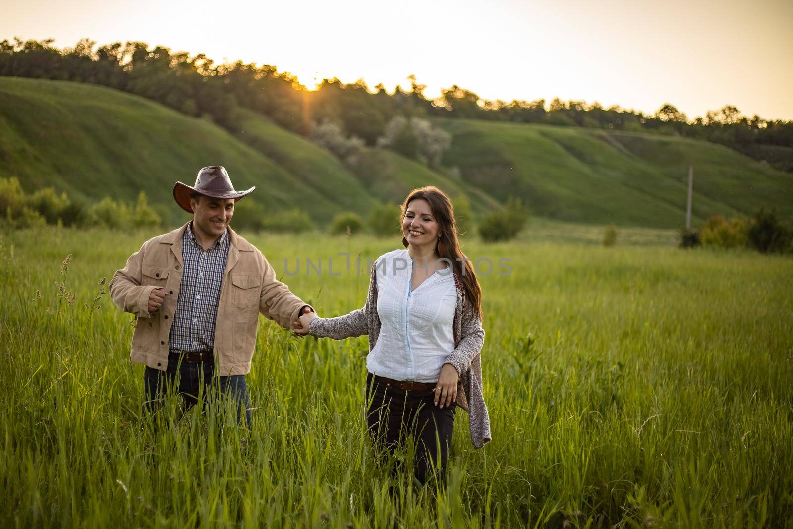 nice portrait of beautiful and young groom and bride outdoors