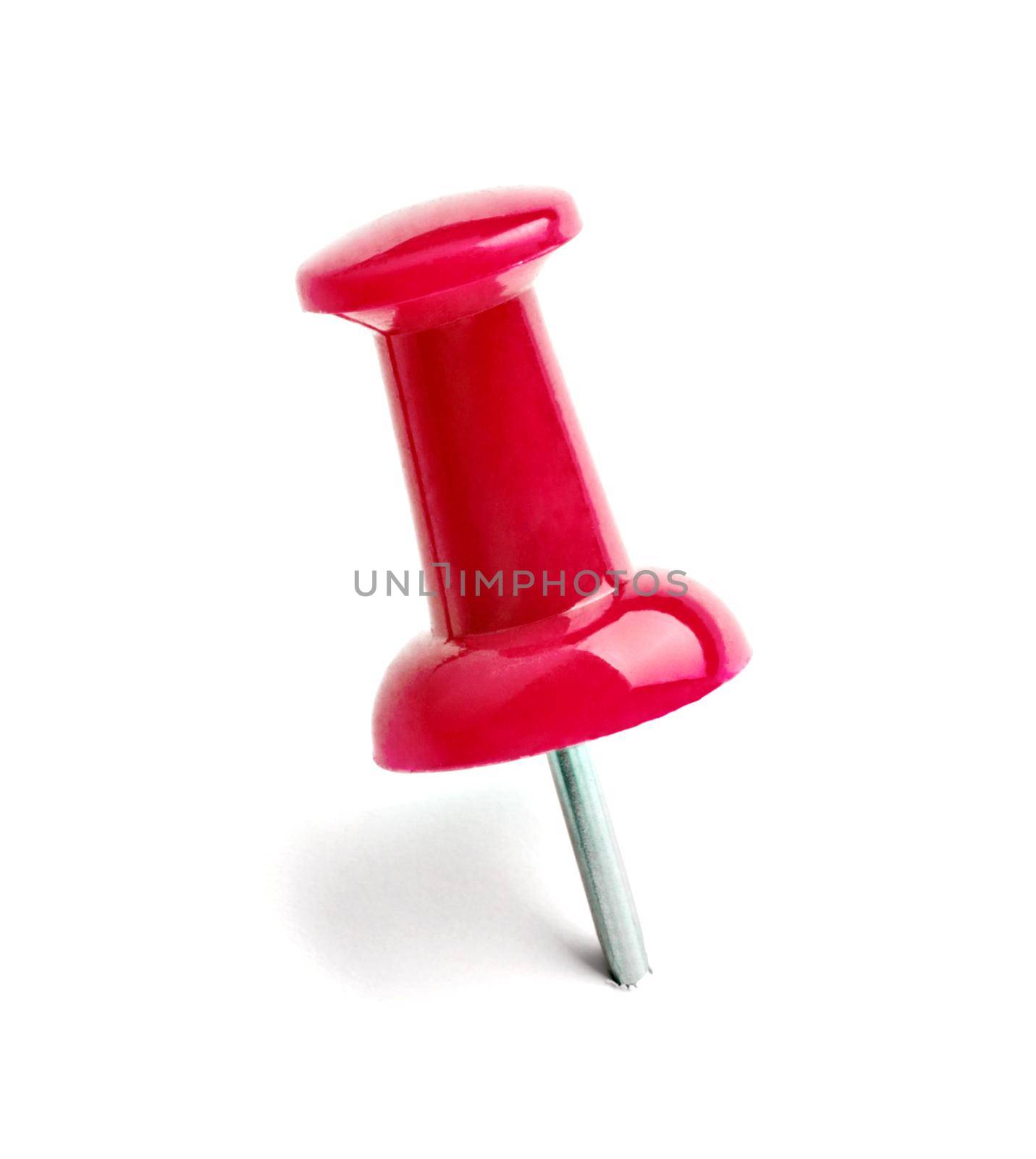 close up of push pin paperclip on white background