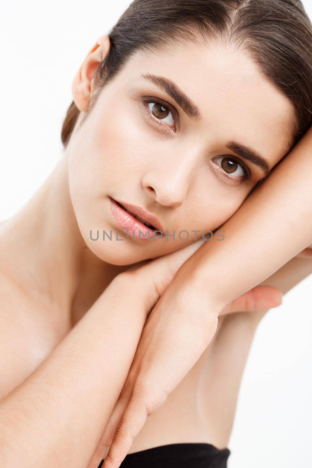 Beauty Youth Skin Care Concept - Close up Beautiful Caucasian Woman Face Portrait with relax sleep gesture. Beautiful Spa model Girl with Perfect Fresh Clean Skin over white background by Benzoix