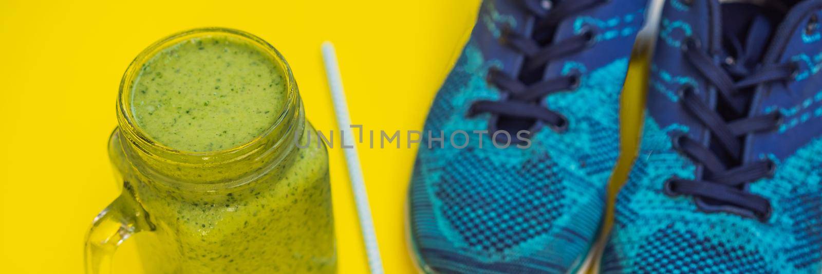 BANNER, LONG FORMAT Everything for sports turquoise, blue shades on a yellow background and spinach smoothies. Yoga mat, sport shoes sportswear and bottle of water. Concept healthy lifestyle, sport and diet. Sport equipment. Copy space.