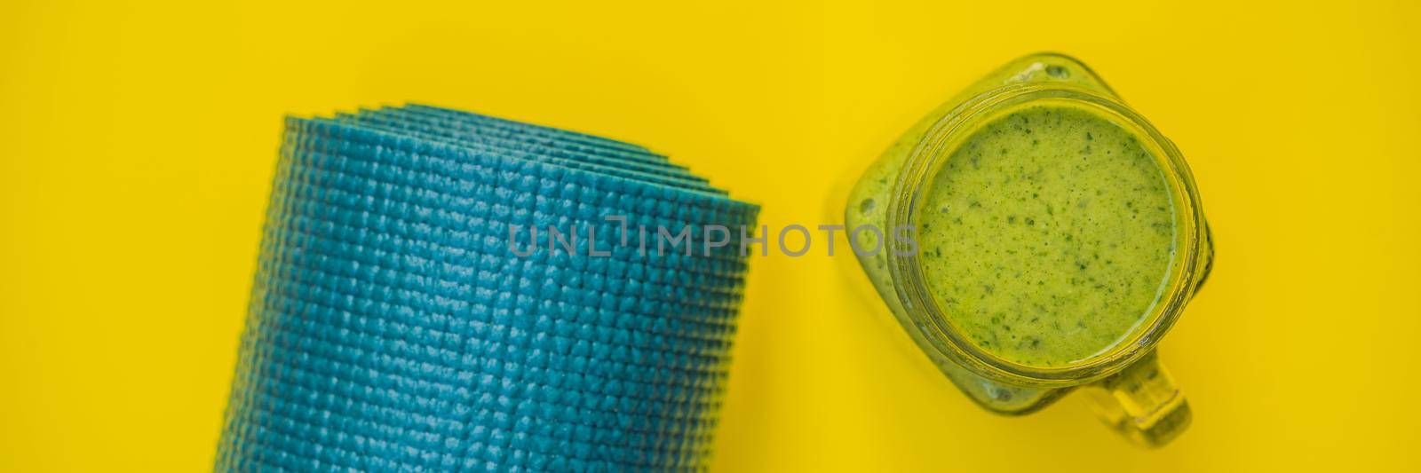BANNER, LONG FORMAT Everything for sports turquoise, blue shades on a yellow background and spinach smoothies. Yoga mat, sport shoes sportswear and bottle of water. Concept healthy lifestyle, sport and diet. Sport equipment. Copy space by galitskaya