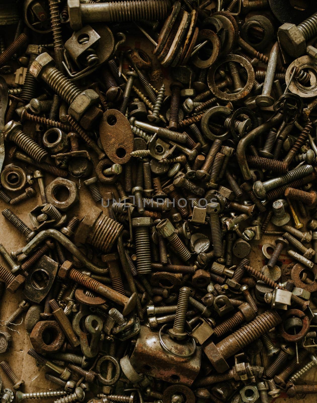 Various old metal iron nuts bolts nails wrenches, things of an engineer.