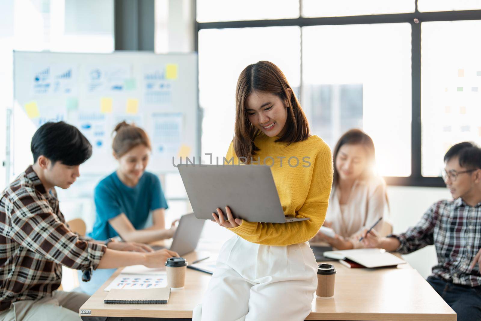Group of asian young creative happy enjoy laugh smile and great success emotion teamwork people business startup entrepreneur casual brainstorm business meeting office background.