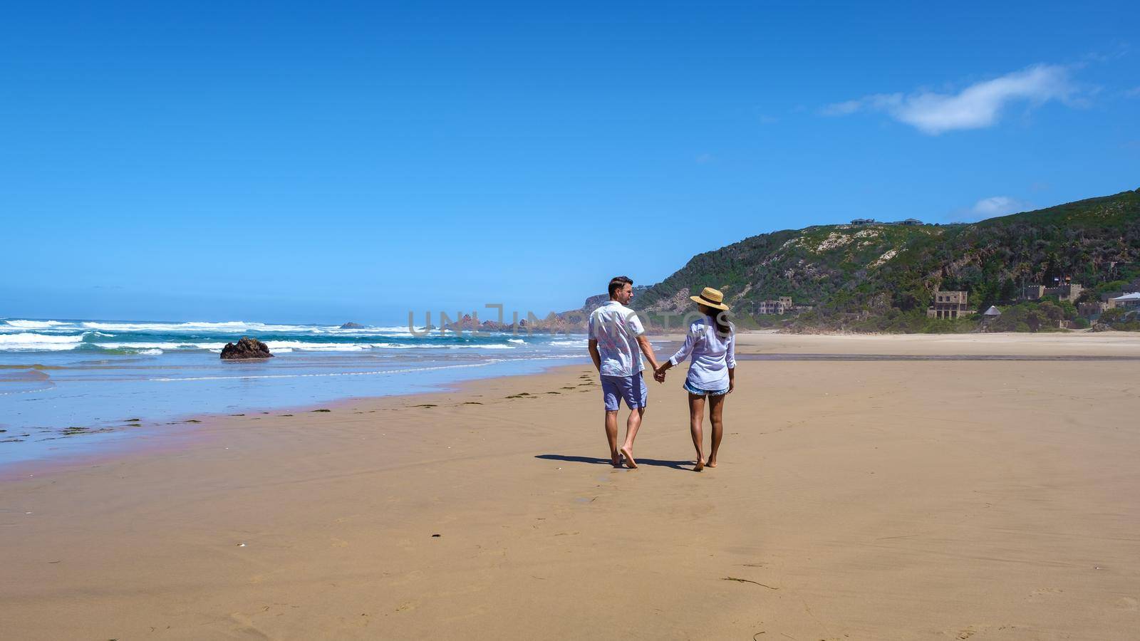 A panoramic view of the lagoon of Knysna, South Africa.beach in Knysna, Western Cape, South Africa couple man and woman on a trip at the garden route by fokkebok