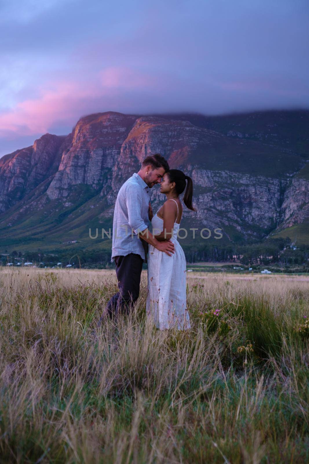 man and woman in grassland during vacation in South Africa, Mountains and grassland near Hermanus at the garden route Western Cape South Africa Whale coast by fokkebok