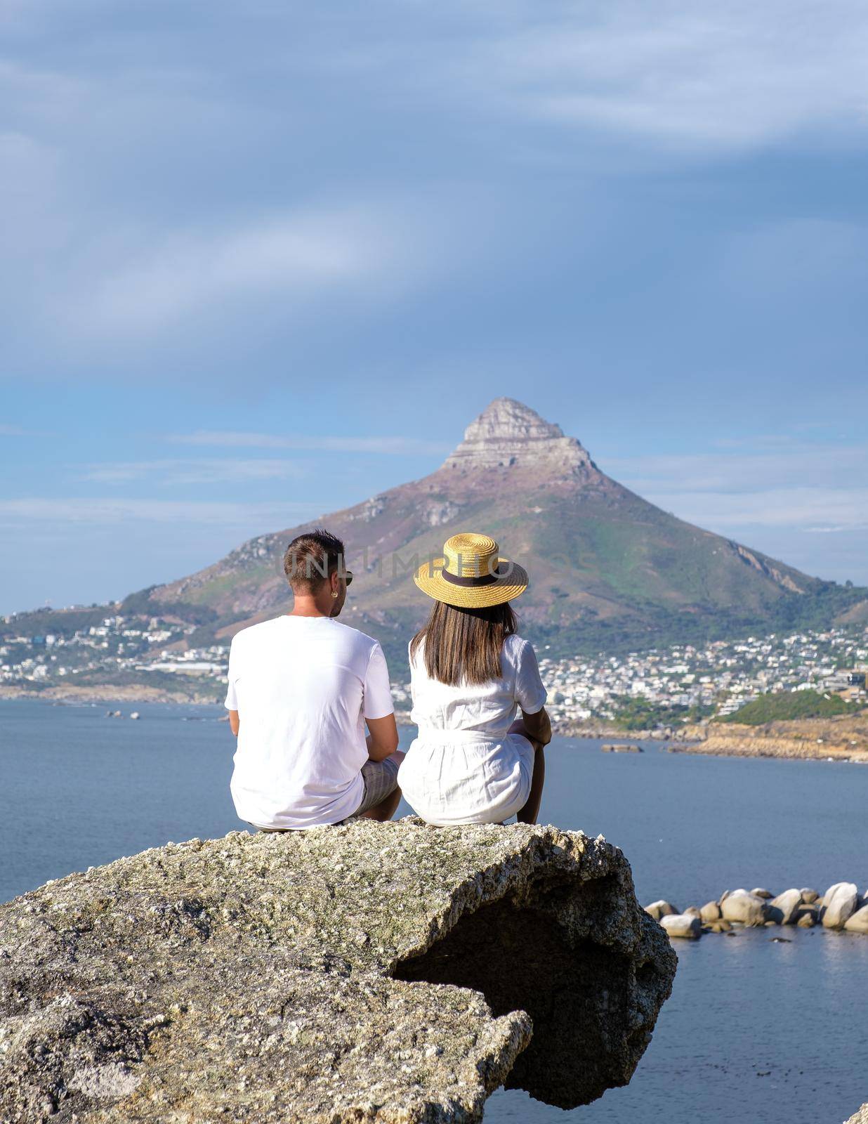 View from The Rock viewpoint in Cape Town over Campsbay, view over Camps Bay with fog over the ocean. fog coming in from ocean at Camps Bay Cape Town