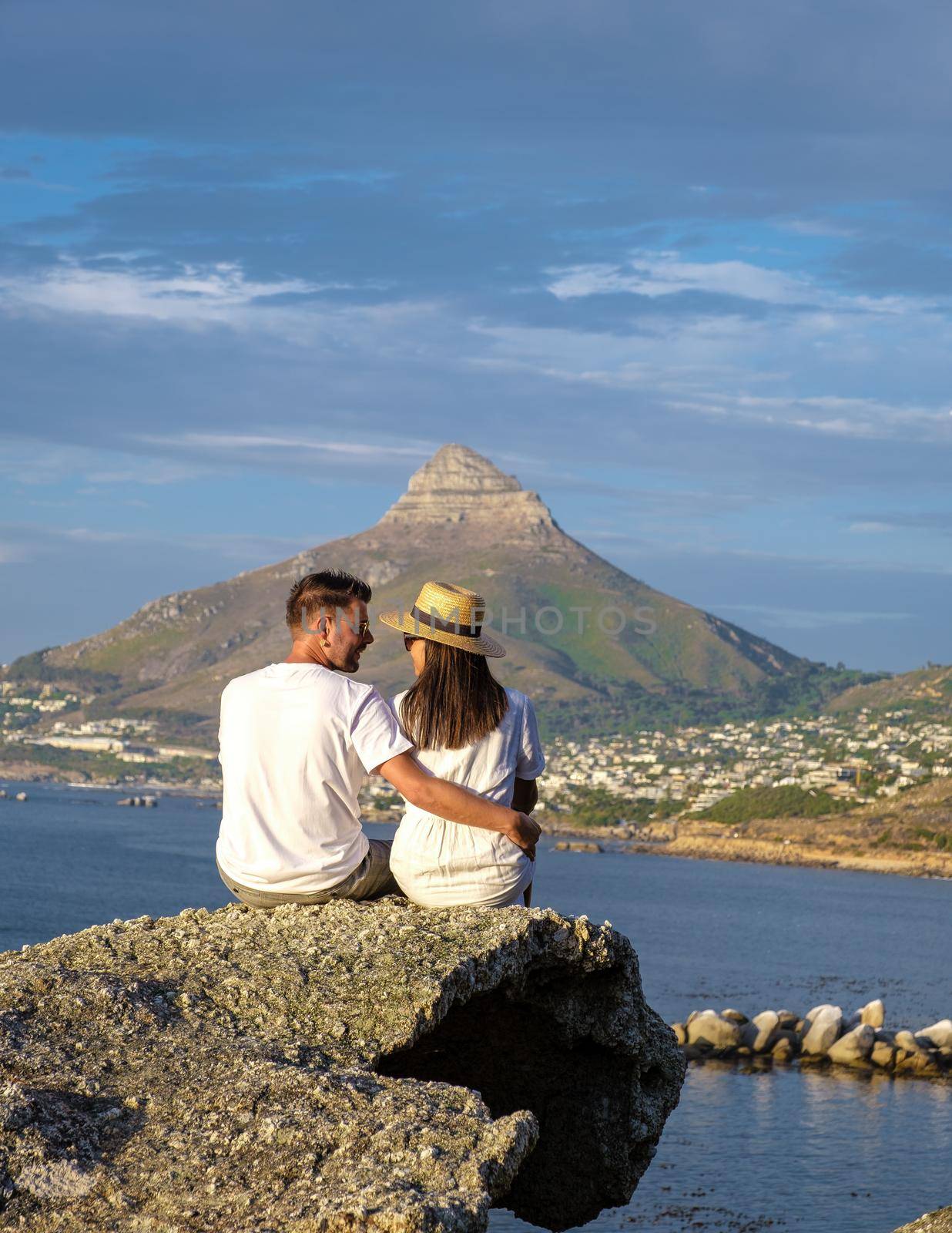 View from The Rock viewpoint in Cape Town over Campsbay, view over Camps Bay with fog over the ocean. fog coming in from ocean at Camps Bay Cape Town