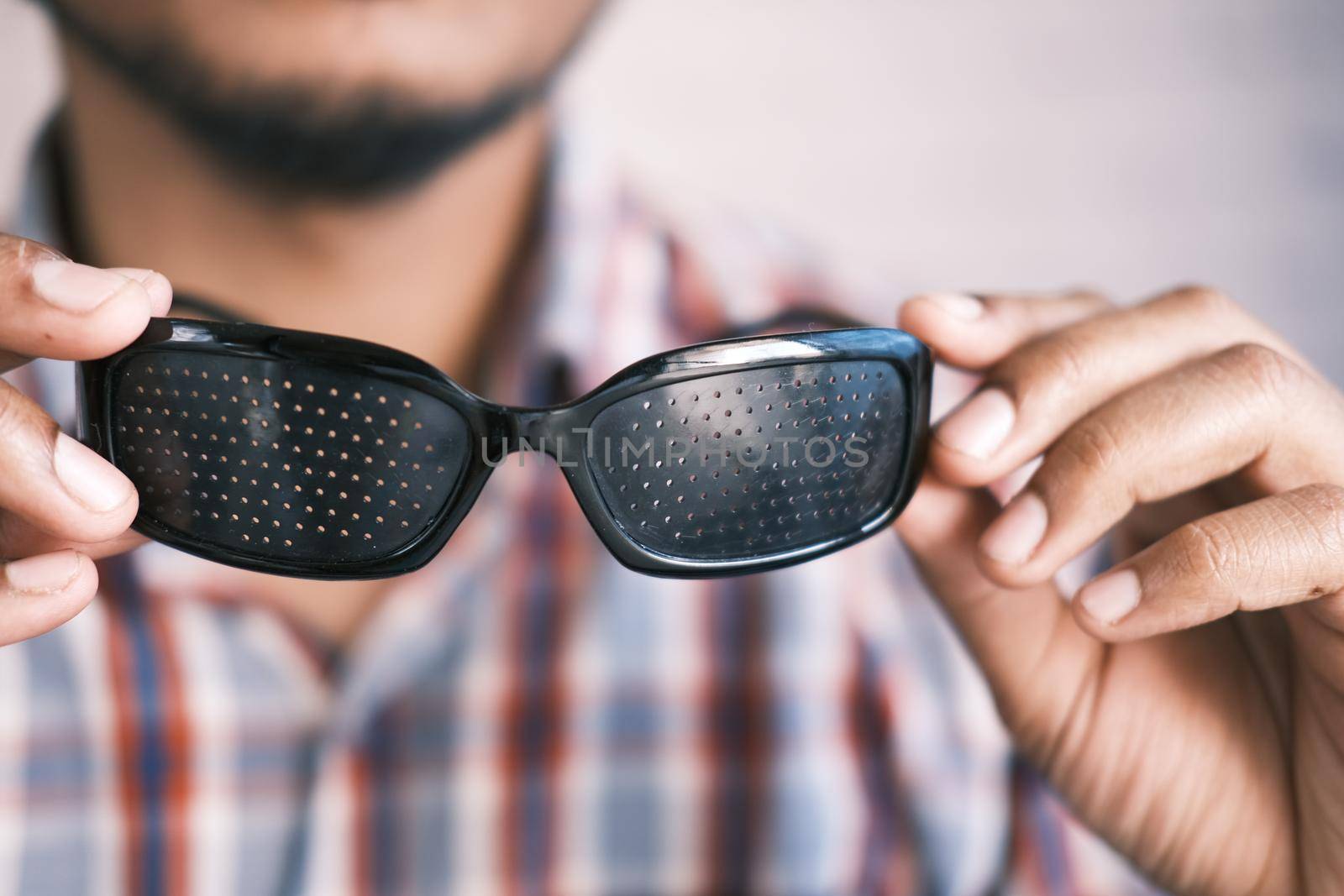 Perforation glasses with holes for training visio