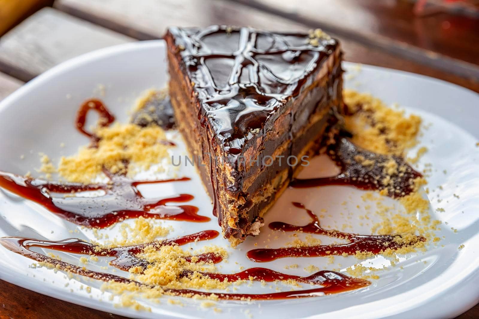 a gourmet piece of chocolate cake, torte on a decorated plate. Selective focus