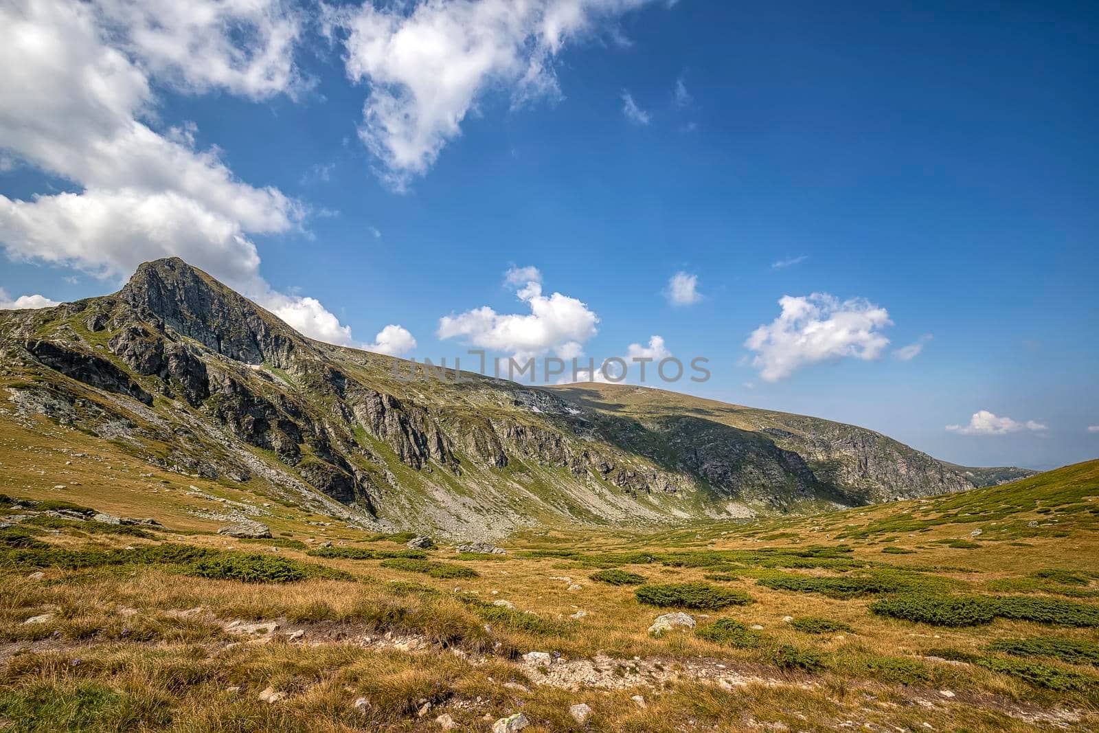 Beauty landscape of the mountain hill and clouds, Rila mountain, Bulgaria